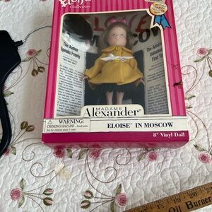 FAO Schwarz Yellow and Black Doll